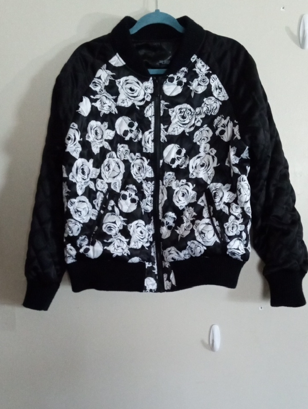Black Zippered Jacket with Skulls and Roses